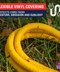 10 Gauge Heavy Duty Lighted Plug Outdoor Extension Cord 25 Ft Yellow Weatherproof laying on grass highlighting vinyl cover.