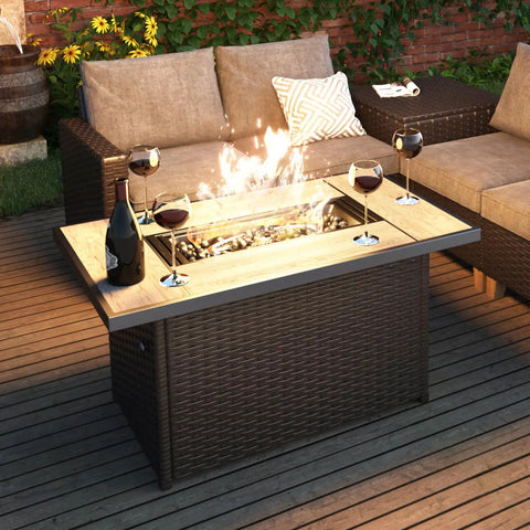 43 Inch Outdoor Gas Fire Pit Table With 60,000 BTU Propane Heat, CSA Safety Approved, Rectangle Fire Pit With Ceramic Tile Top And Wicker Base, Push Button Ignition, Your Go To Patio Dining Or Coffee Table with wine glasses, wicker chairs, and lit flame on wooden deck