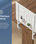 Adjustable White Iron Desk Lift Brackets, 2 Piece Set With Height Adjustable Design on wooden desk with pegboard setup
