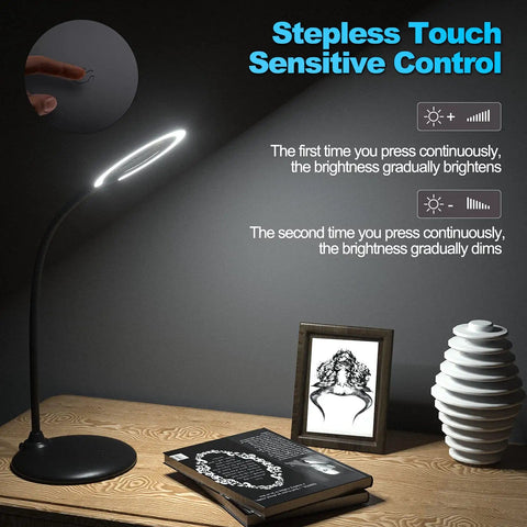 5X Rechargeable Magnifying Glass With Light And Stand next to a book on a wooden desk, highlighting touch control feature.