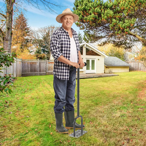 Man using Manual Lawn Aerator Spike Tool With 15 Stainless Steel Spikes Non Slip Grip Handle Grass Aerator For Loosening Soil And Boosting Lawn Health Durable Garden Aeration Tool For Easy Home Lawn Care on a sunny day in a backyard