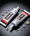 Heavy Duty Clear Industrial Glue Delivers A Hella Tough Bond And Precision Needle Tip For Jewelry Rhinestone Crafts Cell Phone Screen Repairs And Smooth Diy Projects on a dark background with rhinestones.