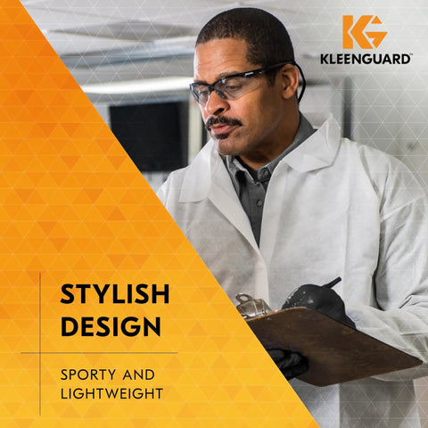 Person wearing Nemesis Indoor Outdoor Safety Glasses With Black Frame, V30 Lenses in a professional setting with clipboard.