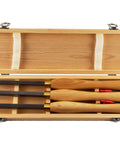Top-down view of a three-piece carbide wood lathe turning chisel set with replaceable tips in a wooden box