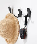 Matte Black Stainless Steel Wall Mounted Coat Hooks Set offers top shelf durability displaying a hat and keys.