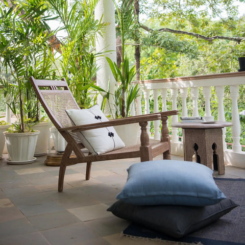 Outdoor Pillow Inserts Pack of 2, 26 by 26 Inches, Water Resistant Cushions on patio chair with plants on porch