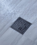 Matte Black 4 And A Quarter Inch Round Shower Drain Grate With Adjustable Threaded Base Flange Built To Last Fits Two Or Three Inch Drain Pipes Stainless Steel Grate ABS Flange Heavy Duty Construction in wet bathroom floor