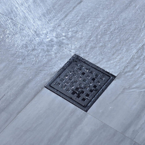 Matte Black 4 And A Quarter Inch Round Shower Drain Grate With Adjustable Threaded Base Flange Built To Last Fits Two Or Three Inch Drain Pipes Stainless Steel Grate ABS Flange Heavy Duty Construction in wet bathroom floor