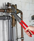 16 Inch XL Red Self Locking Water Pump Pliers With 27 Adjustment Positions Quick Adjust Button in use on plumbing pipes