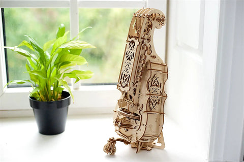 Mechanical Hurdy Gurdy Wooden Puzzle Kit For Adults Build Your Own 3D Medieval Music Instrument And Play Real Melodies With Spring Loaded Keys A Fun Brain Teaser Hobby Set, wooden build on window ledge
