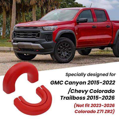 Red Tow Hook Covers For Chevy Colorado And GMC Canyon, Custom Fit 2015-2026 Colorado, 2015-2022 Canyon, Easy Install next to truck