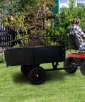 Man towing a Beefy Steel Dump Trailer For ATV UTV And Lawn Gear, 750 Lb Load Capacity, 15 Cu Ft Bed With Removable Sides, in yard