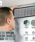 Person installing Magnetic Floor Vent Screen Mesh 4x10 2 Pack Easy Snap In Bug Filter on wall vent with nylon mesh frame.