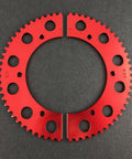 65 Tooth Red Anodized Sprocket For 35 Chain, Pro Grade Alloy Construction, Precision Cut Teeth shown split on dark surface