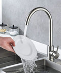 High Arc Commercial Kitchen Faucet Made Of Stainless Steel Brushed Nickel With Single Handle And 360 Degree Swivel For One Hole Bar Sink Modern Pro Grade Durable Design For Busy Kitchens shown in use