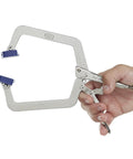 Beefy Locking C Clamp Set With Wide Opening Jaws And Guarded Quick Release Trigger, High Grade Alloy Steel Construction, 2 Piece Clamp Bundle For Securing Tapered Or Odd Shaped Work On Any Project. alloy steel locking C clamp held by hand