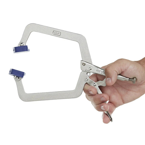 Beefy Locking C Clamp Set With Wide Opening Jaws And Guarded Quick Release Trigger, High Grade Alloy Steel Construction, 2 Piece Clamp Bundle For Securing Tapered Or Odd Shaped Work On Any Project. alloy steel locking C clamp held by hand