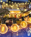 120ft Outdoor G40 LED Globe String Lights End-To-End Connectable With 60 Waterproof Shatterproof Bulbs illuminating a backyard patio