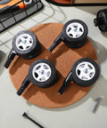Four Pack White Twin Swivel Caster Kit For Baby Walker Replacement Wheels Runs Slick On Any Floor Premium Built Zero Fuss Easy Swap Stroller Parts, top view on cork base.