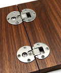 Four Pack Heavy Duty Concealed Hinges Sleek Flush Mount Setup Dead Simple Install For Smooth Ninety Degree Swing Zero Visible Hardware Built Tough With Grade A Zinc Alloy Perfect For Cupboards Desks And Folding Tables Game Changer visible installed on a wooden surface.