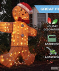 Gingerbread man holiday decoration lit outdoors, ideal for All Weather Outdoor Extension Cord 25 Ft Heavy Duty Lighted 3 Prong 16/3 SJEOW For Cold And Hot Temperatures Indoor And Outdoor Use Built Tough For Extreme Conditions And Flexible In Freezing To Scorching Heat Rugged Weatherproof Design