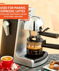 Compact Electric Bistro Style Espresso And Cappuccino Maker With Durable Glass Carafe on countertop making espresso.
