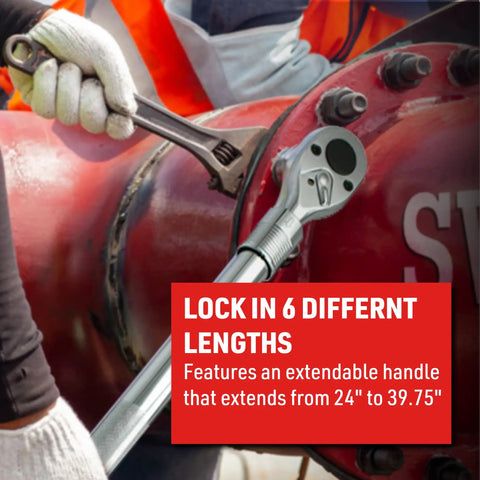 Locking telescoping shaft ratchet extends 24 to 39 inches, reinforced steel, knurled grip in use on large industrial pipe.