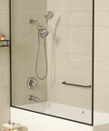 Matte black tub and shower faucet set with dual shower heads, featuring a four-way valve and single lever control in modern bathroom.