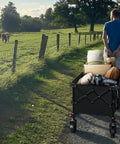 Man pulls Grab And Go Foldable Camp Wagon With Wheels Heavy Duty Cart Holds 220 Lb And 100L Capacity for outdoor adventures