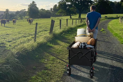Man pulls Grab And Go Foldable Camp Wagon With Wheels Heavy Duty Cart Holds 220 Lb And 100L Capacity for outdoor adventures