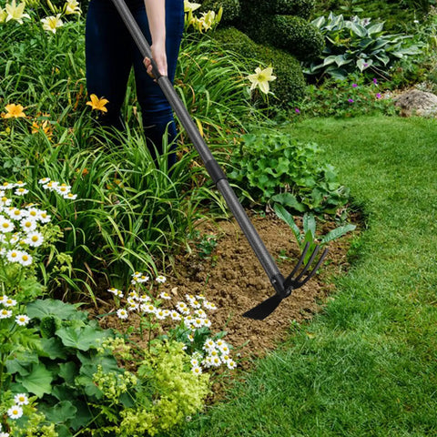 Gardener using 2 In 1 Garden Hoe Cultivator With 45 Inch Long Handle For Weeding And Soil Loosening in flower bed