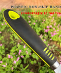 Close-up of black and green plastic non-slip handle of Five Claw Landscape Garden Rake Dethatcher Grab And Go All In One Tool