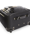 Underseat Carry On Luggage With Wheels, Compact Croc Black Travel Bag For Planes, sturdy bottom view with inline skate wheel system