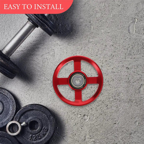 Two Piece Fitness Pulley Wheel Replacement For Gym Cable Systems Aluminum Alloy Durable Construction next to dumbbell weights