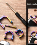 Alloy Miniature Keychain Clip With Detachable Tool And Screwdriver Precision Crafted Multicolor on wood surface
