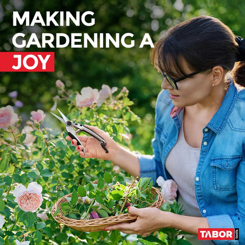 Woman using K18A Straight Pruning Shears Florist Scissors Multi Tasking Garden Snips for trimming flowers in garden.