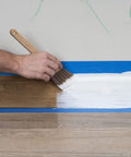 Applying 1-2-3 Plus Water Based Primer Stain Blocking For Interior And Exterior Surfaces White 1 Quart to wood trim with brush