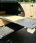 Heavy Duty Ball Bearing Drawer Slides One Pair Smooth Glide Full Extension With Auto Lock Latch and Quick Release Side Mount No Sweat Setup For Garage Cabinets Workbench 12 Inch installed in truck bed with sliding wooden surface