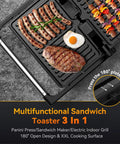 Yashe 1200W Panini Press Grill and Sandwich Maker With Nonstick Plates, cooking sausages, steak, and a fried egg on griddle.
