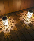 Solar Powered Outdoor Lanterns Waterproof White Table Lanterns Set Of 2 For Outdoor Use Hanging LED Lights illuminating wooden deck