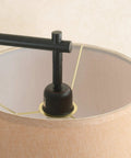 Close-up of adjustable swing arm and swivel shade on Oil Rubbed Bronze Sweep Wall Lamp, sleek minimalist vibe.