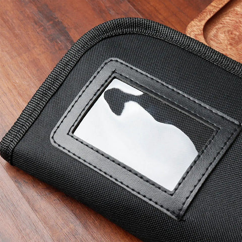 Close-up of a black knife bag with a zippered pouch, part of the Roll Up Knife Bag Case With Zippered Pouch For Secure Knife Transport.