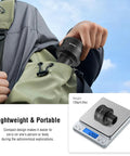 Canon Compatible T2 Mount Lens Adapter for EOS M Cameras With M42 to 1.25 Inch Telescope Adapter being placed in backpack with weight shown as 120g on scale