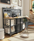 60 Inch Heavy Duty Garage Workbench With Pro Grade Tool Organizer System in home office setting with woman reading