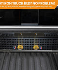 Magnetic Cargo Grabber Reach Tool 6.9 Ft Extendable Truck Bed Retriever with metal plate attached to truck bed.