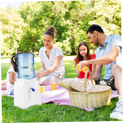 Portable Water Dispenser And Compact Bucket Holder Faucet For Outdoor Camping And RV Use at a family picnic in a park