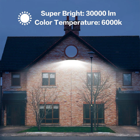 Night view of house illuminated by 2 Pack 300W LED Flood Lights Ultra Bright 30000LM IP66 Waterproof Outdoor Security Flood Lighting