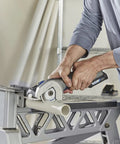 Rock Solid Heavy Lifter 20V Compact Circular Saw Kit cutting PVC pipe with precision and ease, showcasing a sturdy design and grip.