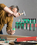 Red Wall Mount Screwdriver And Pliers Organizer Rack With 23 Holes, installed on wall with tools in garage workspace
