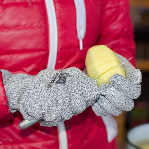 Person wearing Level 5 Cut Resistant Warehouse Work Gloves Crinkle Latex Coated Palm And Fingers slicing fruit